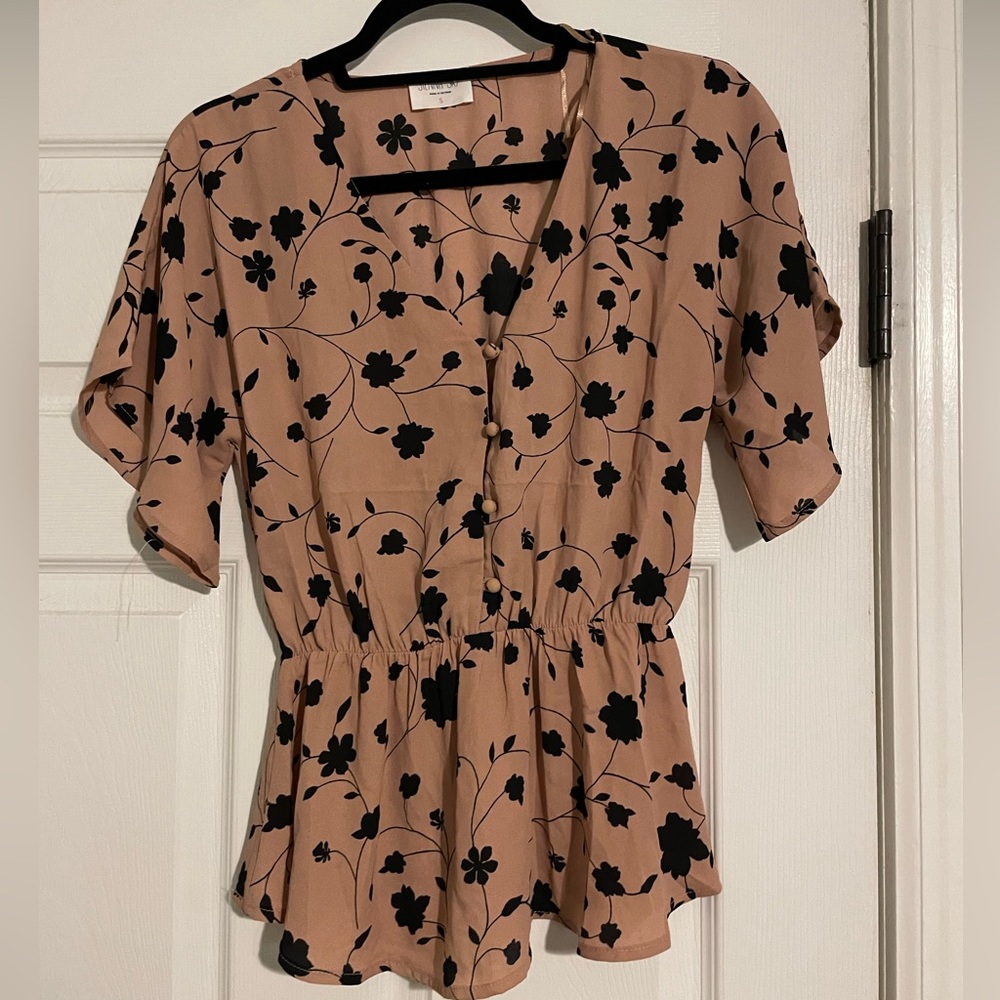 Pink and black floral shirt